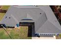 Aerial shot showing the roof of the home and the front yard at 6211 Se 126Th St, Belleview, FL 34420