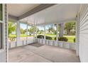 A sunny and spacious screened-in porch with a concrete floor at 8532 Sw 65Th Court Rd, Ocala, FL 34476
