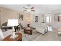 Bright living room with plush seating, elegant decor, and a sophisticated ambiance at 4360 Sw 62Nd Loop, Ocala, FL 34474