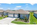 A beautiful home with a well-kept lawn, complementing neighborhood, and well-maintained surroundings at 6046 Sw 86Th Cir, Ocala, FL 34481