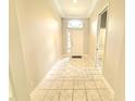 Welcoming entryway features tiled floors, high ceilings, and decorative moldings at 2515 Se 19Th Cir, Ocala, FL 34471