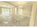 Spacious living room with open floor plan, decorative columns and ample natural light at 2515 Se 19Th Cir, Ocala, FL 34471