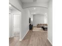 Bright and spacious living room with wood flooring, recessed lighting, and an open layout at 4909 Se 89Th St, Ocala, FL 34480