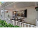 Cozy front porch with seating, perfect for enjoying a cup of coffee at 8681 Sw 93Rd Pl # B, Ocala, FL 34481