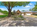 Manicured lawn and villa with a garage at 9330 Sw 84Th Ter # A, Ocala, FL 34481