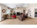 Inviting living room with neutral tones, plush seating, and ample natural light at 3887 Sw 156Th Pl, Ocala, FL 34473