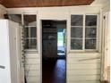 View from the utility room through the back of the house out to the front at 922 Se 13Th St, Ocala, FL 34471