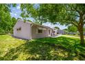 Charming home with a well-maintained lawn and inviting front porch, perfect for relaxing outdoors at 9021 Sw 108Th Pl, Ocala, FL 34481