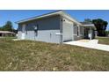 Charming single-story home featuring a well-maintained lawn and an attached one car garage at 14437 Sw 21St Pl, Ocala, FL 34481