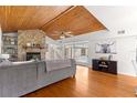 Open floor plan living room with a view of the pool and fireplace at 2475 Sw 7Th Ave, Ocala, FL 34471