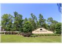 A community entrance sign reads 'Lake Diamond', enhanced by manicured landscaping at 96 Hickory Crse, Ocala, FL 34472
