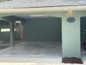 This home features an attached carport, perfect for shielding your vehicles from the weather and providing extra storage at 4911 Se 135Th Pl, Summerfield, FL 34491