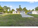 Well-maintained single-story home on a spacious lot with a long driveway at 12988 Se 42Nd Ct, Belleview, FL 34420
