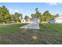 Well-maintained single-story home on a spacious lot with a long driveway at 12988 Se 42Nd Ct, Belleview, FL 34420
