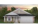 Charming single-story home with a two-car garage featuring stone and siding accents at 3131 Ne 46Th Ave, Ocala, FL 34470