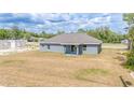 Expansive backyard showcases the property's potential for outdoor living and entertainment at 400 Mariion Oaks Crse, Ocala, FL 34473