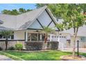 Charming home boasts a well-maintained lawn, attractive landscaping, and a welcoming two-car attached garage at 8785 Sw 93Rd Ln # C, Ocala, FL 34481