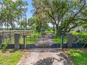 Gated entrance to a property named 'Prime Time' at 402 Sw 127Th Pl, Ocala, FL 34473