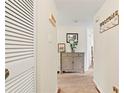 Inviting hallway featuring neutral tones, elegant decor, and a welcoming atmosphere at 688 Midway Dr # B, Ocala, FL 34472