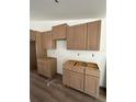 Kitchen features new cabinetry, ready for appliances and countertops installation at 7292 Hemlock Loop, Ocala, FL 34472