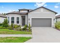 Charming single-story home with a well-manicured front yard and a two-car garage at 8809 Sw 61St Loop, Ocala, FL 34481