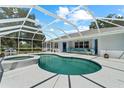 Relaxing screened pool with hot tub and backyard views at 2698 Sw 186Th Ct, Dunnellon, FL 34432