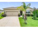 Charming single-Gathering home with a well-manicured lawn, complemented by mature landscaping and a two-car garage at 9237 Sw 60Th Terrace Rd, Ocala, FL 34476