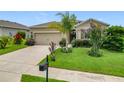 Charming single-Gathering home with a well-manicured lawn, complemented by mature landscaping and a two-car garage at 9237 Sw 60Th Terrace Rd, Ocala, FL 34476