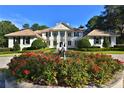 Beautiful home with a flower garden in the front at 4026 Nw 85Th Ter, Ocala, FL 34482