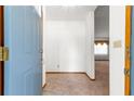 A front entryway with neutral carpet leads into a spacious living area at 4880 Ne 23 Ave, Ocala, FL 34479