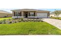 Cozy single-story home with lush front lawn and charming curb appeal at 10562 Sw 96Th Lane Rd, Ocala, FL 34481