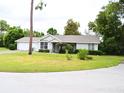 Well maintained single-story home featuring an attached garage, and an inviting front yard at 8321 Sw 108Th Place Rd, Ocala, FL 34481