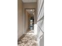 Inviting entryway with neutral tones, tiled floor and an open view into the home's interior at 3947 Nw 46Th Ter, Ocala, FL 34482