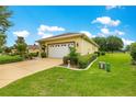 The house features an attached garage and well-maintained landscaping at 9551 Sw 92Nd Ter, Ocala, FL 34481
