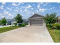 A well-maintained single-story home, with a two-car garage and neat landscaping enhancing its curb appeal at 7881 Sw 89Th Cir, Ocala, FL 34481