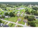An aerial view showing the location of the home and the surrounding neighborhood at 11 Pecan Course Loop, Ocala, FL 34472