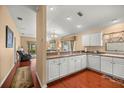 Bright kitchen with ample countertop space, perfect for entertaining at 1204 Flamingo Pl, The Villages, FL 32162
