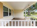 Covered porch showcasing a welcoming entrance and protection from the elements at 8625 Sw 94Th Ln # A, Ocala, FL 34481