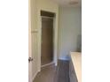 Bathroom featuring a glass-enclosed shower with neutral walls and flooring at 9722 Sw 95Th Ct # C, Ocala, FL 34481