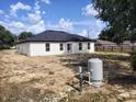 A expansive backyard showing the blank canvas for a future outdoor living space at 9721 Bahia Rd, Ocala, FL 34472