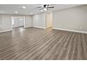 Spacious living room with sleek flooring, neutral walls, and abundant natural light at 5 Bahia Circle Pl, Ocala, FL 34472