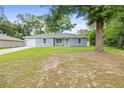 Charming single-story home with a well-maintained lawn and inviting curb appeal at 2924 Se 142Nd Pl, Summerfield, FL 34491