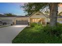 Charming single-story home with a two car garage and a manicured front yard at 9085 Sw 96Th Ln # B, Ocala, FL 34481
