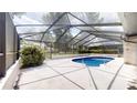 Enclosed pool area features a clean patio and a well-maintained pool perfect for relaxation and outdoor fun at 4121 Sw 6Th Ave, Ocala, FL 34471