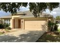 Inviting single-story home with a spacious driveway and attached two car garage at 3983 Sw 51St Ct, Ocala, FL 34474