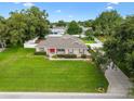 Desirable single story home with well manicured lawn and professional landscaping on an oversized lot at 4360 Se 106Th St, Belleview, FL 34420