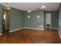 View of the spacious living room featuring wood floors, recessed lighting, and a ceiling fan at 8655 Sw 98Th Street Rd # G, Ocala, FL 34481