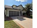 Inviting single-Gathering home with a landscaped yard, two-car garage, and a charming entrance at 9395 Sw 70Th Loop, Ocala, FL 34481
