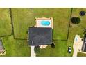Overhead shot of property with a pool and a large fenced in yard at 1829 Nw 85Th Loop, Ocala, FL 34475