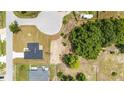 Aerial view of the house in a cul-de-sac, showcasing the roof and surrounding landscape at 5 Dogwood Loop Ave, Ocala, FL 34472